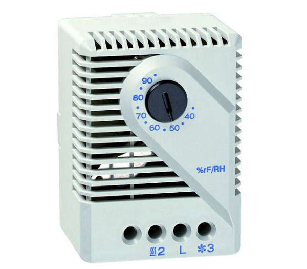 A mechanical hygrostat with a white casing, temperature range markings, and terminal connections labeled for L1, L2, and L3.