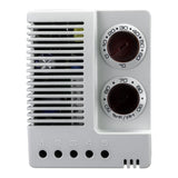 Vintage-style air conditioning control panel with temperature dials and fan settings.