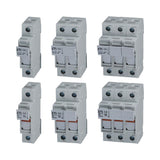 Set of six electrical circuit breakers on a white background