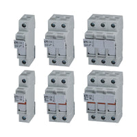 Set of six electrical circuit breakers on a white background