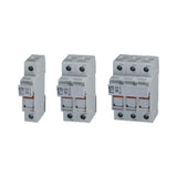 Three electrical circuit breakers with ETI branding on a white background