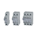 Three ETI circuit breakers of different ratings on a white background