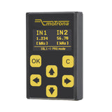 Black electronic device with yellow buttons and display on a white background