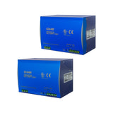 Two blue power supplies with visible branding and certification logos on a white background
