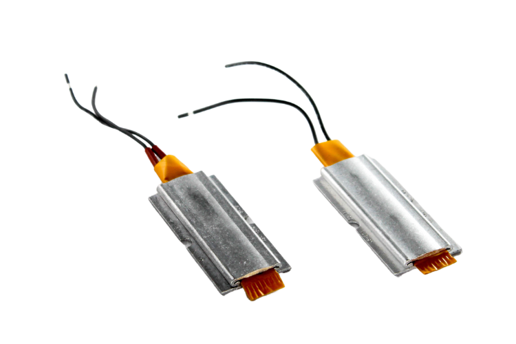 Two metallic cylindrical components with wires on a white background