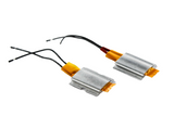 Two metallic flat components with wires on a white background