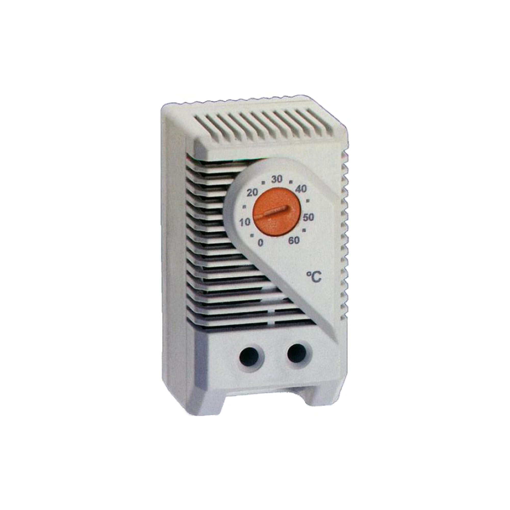 White thermostat with a heating dial on a white background.