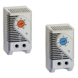 Two thermostats with different colored display elements on a white background.