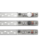 Three LED light strips with switches on a white background