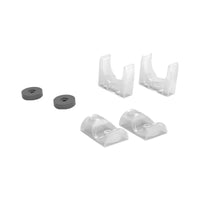 Set of white plastic components and gray rubber washers on a white background