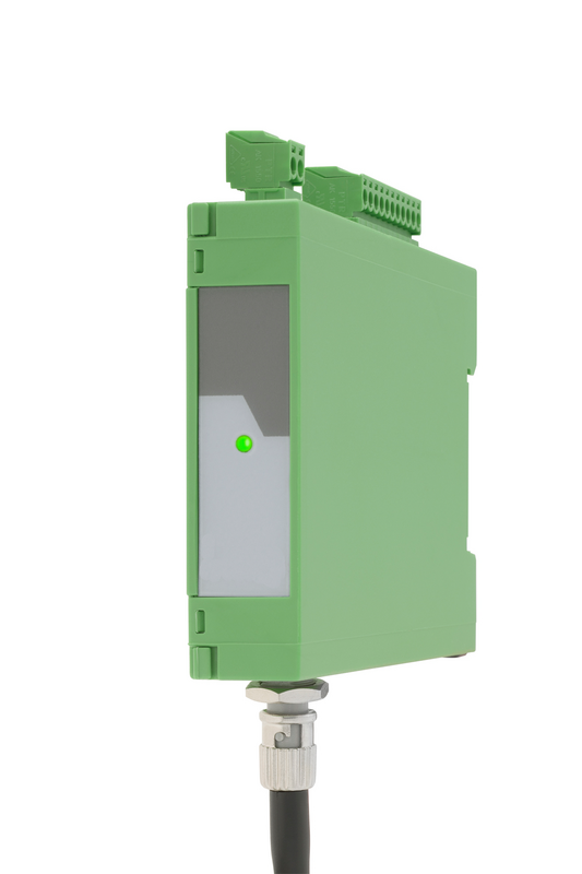 Green industrial sensor module with a cable on a white background.