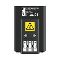 Black electronic device with warning label on a white background